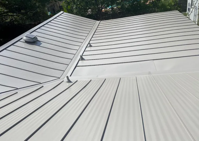 Solar attic fan installed on a metal roof for Roof Ventilation in Westlake Village